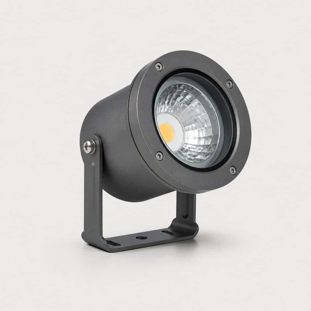 Spot LED extérieur rond à corps anthracite et joint d'étanchéité, sur fond clair